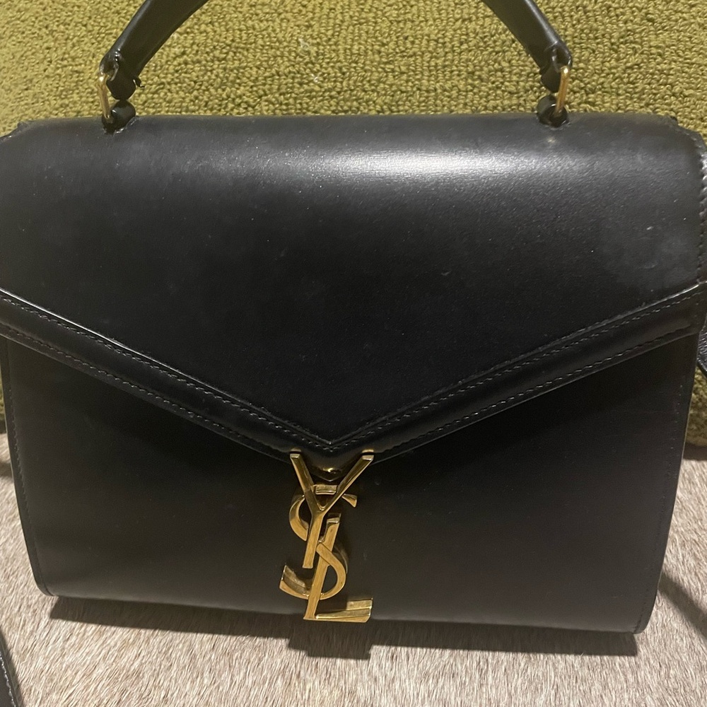 SOLD Yves Saint Laurent Black Bag with Gold Accents